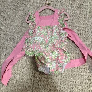The Yellow Lamb Pink Ruffle Baby Romper with Green Leaf Print